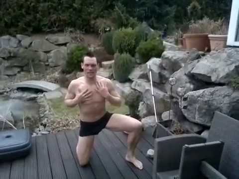 Dude diving into a frozen pool